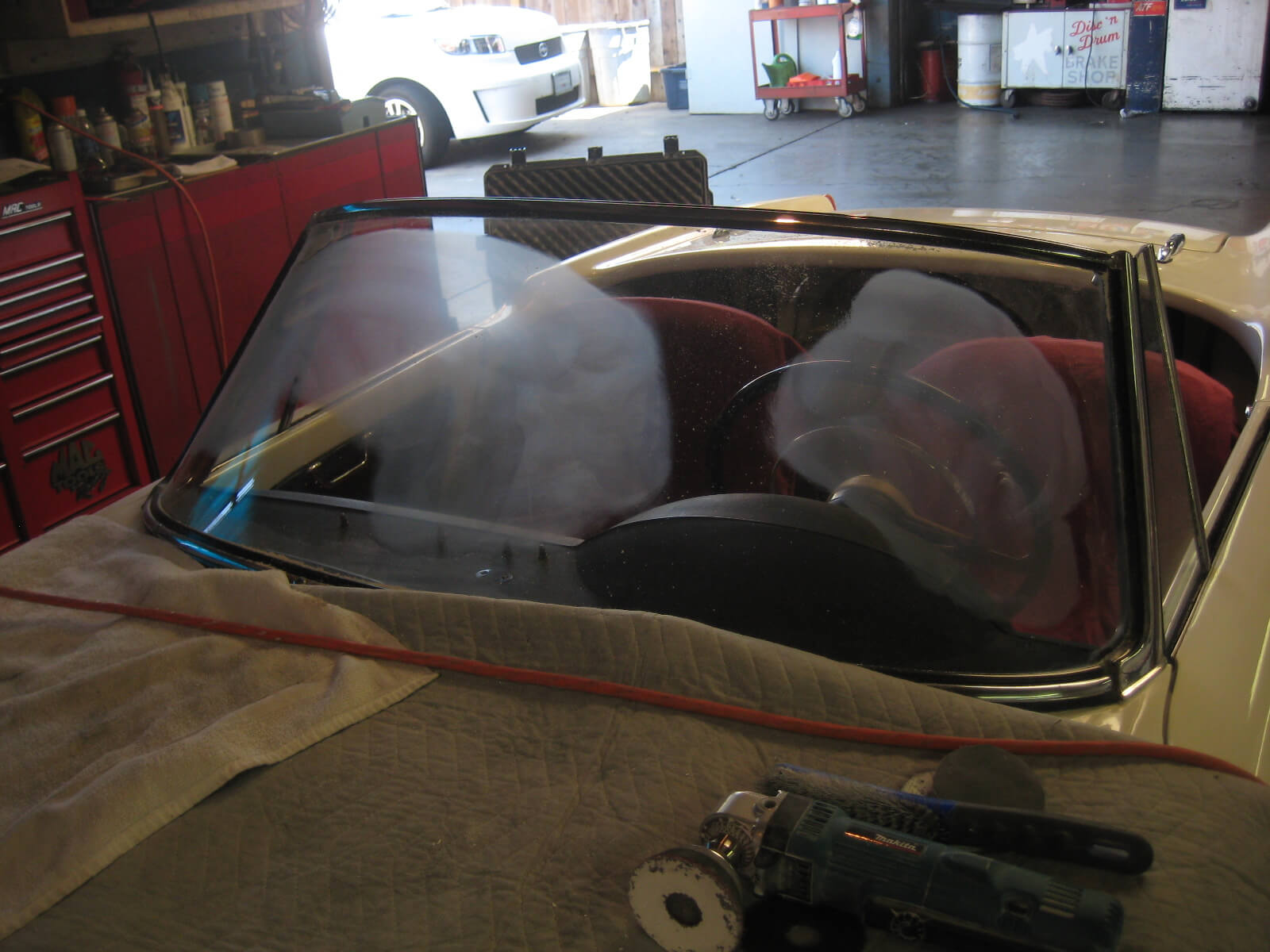 The glass scratch removal process requires resurfacing the damage first. Manhattan Beach, CA